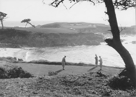 Dr. Alister MacKenzie teeing off of 16 with his wife, Hilda, and her friend taking photos, 1930